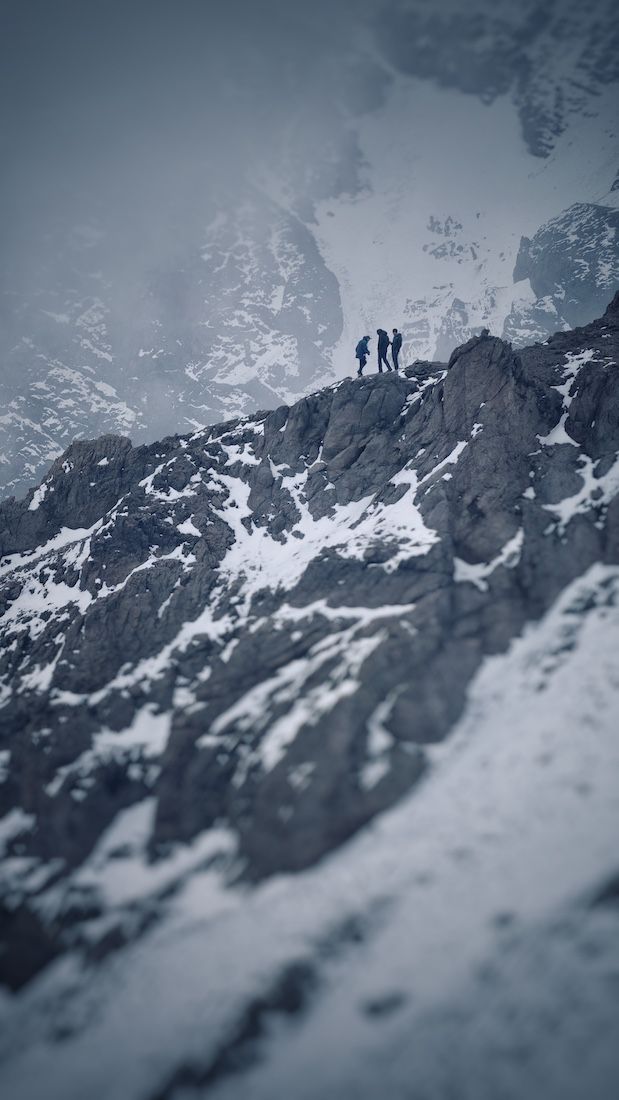 Climbers on a snowy ridge